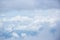 Cloudy and blue sky for background. nature background white cloud and blue sky view from airplane windows.