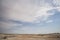 Cloudy blue sky in the hilly Kazakh steppe