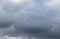 Cloudy blue sky with silhouettes of seagulls flying in A CoruÃ±a, Galicia, Spain