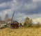 Cloudy day in early spring. Abandoned farm buildings. Russia.