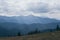 Cloudy day over Carpathian mountains with Hoverla in the center. Tonal perspective of moutain ranges