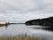 Cloudy day on a river bay. Silent water and forest. Countryside. Russian nature. Day outdoor. Summer, August 2018.