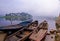 On a cloudy day, Three small boats were floating on the Xin`An river of China.