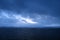 Cloudy evening view of the Avacha Bay. Ships standing in the roadstead, mountains in the background. Petropavlovsk-Kamchatsky,