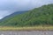 Cloudy, Green Hillsides Along the Coast