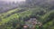 cloudy himalayan mountains foothills, tea plantation and countryside area of darjeeling in west bengal