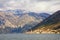 Cloudy Mediterranean landscape with sunny seaside town. Montenegro, Bay of Kotor