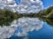 Cloudy reflections and Smiths Pool