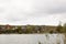 Cloudy river landscape with old castle on shore. Belgorod, Russia