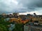 Cloudy skies after rain fall, Howrah Bridge with Kolkata GPO, and many government offices in the distance.