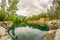 Cloudy skies and reflections at a quarry