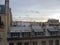 Cloudy sky above the roofs of Paris