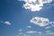 Cloudy sky. The airspace. Clouds in the blue sky. Environment