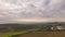 Cloudy sky in autumn near Ulm with Ulm minster approaching aerial time lapse