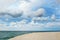 Cloudy sky and blue sea, port of Ostuni, Apulia, Italy