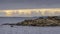 Cloudy sky and calm sea at sunset time, Rosas bay , Costa Brava, Spain