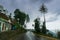 Cloudy sky and curve of Himalayan road, monsoon landscape of Garhwal, Uttarakhand, India. Climate change effect on Himalays