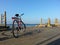 Cloudy sky and narrow mountain roadthe bicycle at the port with sunny day