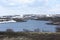 Cloudy sky over the flood in the spring tundra.