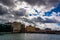 Cloudy sky over Fort Point Channel and old buildings in Boston