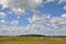 The cloudy sky over the summer steepe