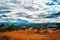 Cloudy sky over the valley with wild plants at the Tatacoa Desert, Colombia at sunset