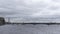 Cloudy sky and river water on a bridge in Saint Petersburg