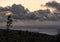 Cloudy sunrise along the shoreline in Hawaii Volcanoes State Park in Hawaii Island.