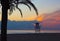 Cloudy sunrise over Mediterranean Sea beach in Valencia region of Spain.