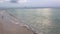 Cloudy Sunrise with Pelicans and Seagulls in Spring at Miami Beach, Florida.