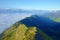 Cloudy sunrise ridge view from the Augstmatthorn in the Bernese Oberland. Overlooking the scenery of lake Brienz, Brienzersee,