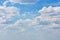 Cloudy weather, blue sky with cumulus clouds, cloudscape background wallpaper backdrop. Natural sky for design