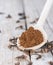 Clove Powder on a wooden spoon