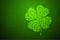 Clover 4 leaf shape Particle Geometric Bokeh circle dot pixel pattern green color illustration on green gradient background with