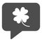 Clover leaf in chat bubble solid icon. Shamrock sticker in dialog glyph style pictogram on white background. Floral