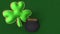 A clover with a pot of gold. Symbols for Saint Patricks day