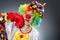 Clown with boxing gloves in funny concept