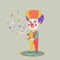 Clown boy shooting a party popper confetti.