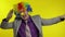 Clown businessman entrepreneur dancing, celebrate, making silly faces at work