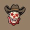 The clown head mascot wears a cowboy hat