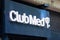 Club Med sign text and logo brand front entrance office travel agency club