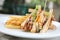 Club sandwich , Sandwich with egg bacon chicken tomato with fried