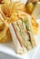 Clubhouse sandwich with potato chips