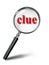 Clue red word mystery concept with magnifying glass