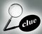 Clue word mystery concept with magnifying glass