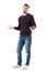 Clueless young casual man shrugging shoulders holding mobile phone