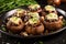 cluster of barbecue cooked mushrooms stuffed with havarti cheese