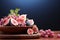 A cluster of fresh ripe grapes and figs in a wooden bowl on a wooden serving plate