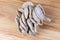 Cluster of raw oyster mushrooms on a wooden cutting board