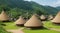 Cluster of thatched-roof huts in a remote village.